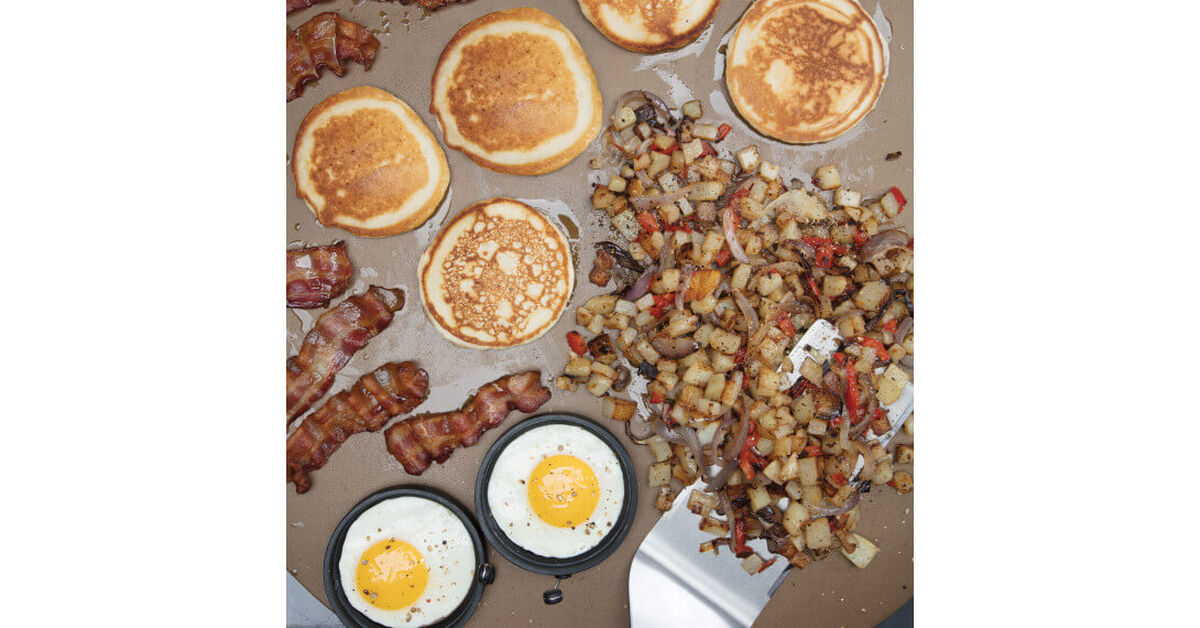 7 Piece Griddle Set - Includes 2 Multi-Functional Spatulas, 2 Squirt Bottles, 2 Silicone Egg Rings, a Griddle Scraper 1