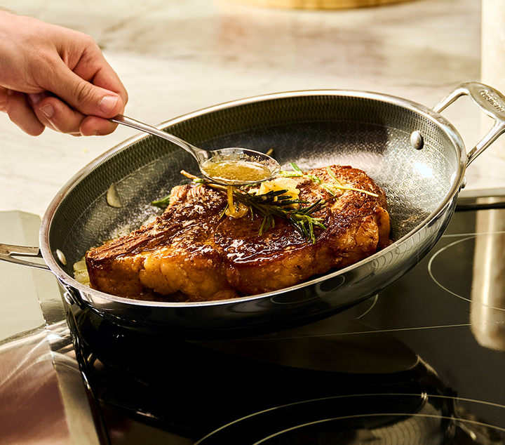 steak being cooked on pan