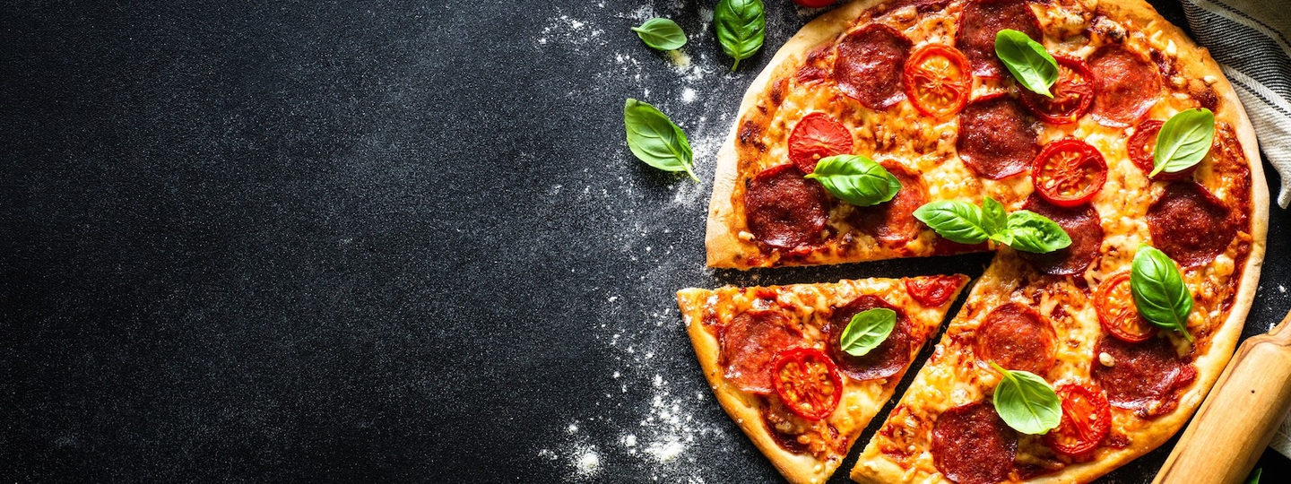 Pizza on black counter top