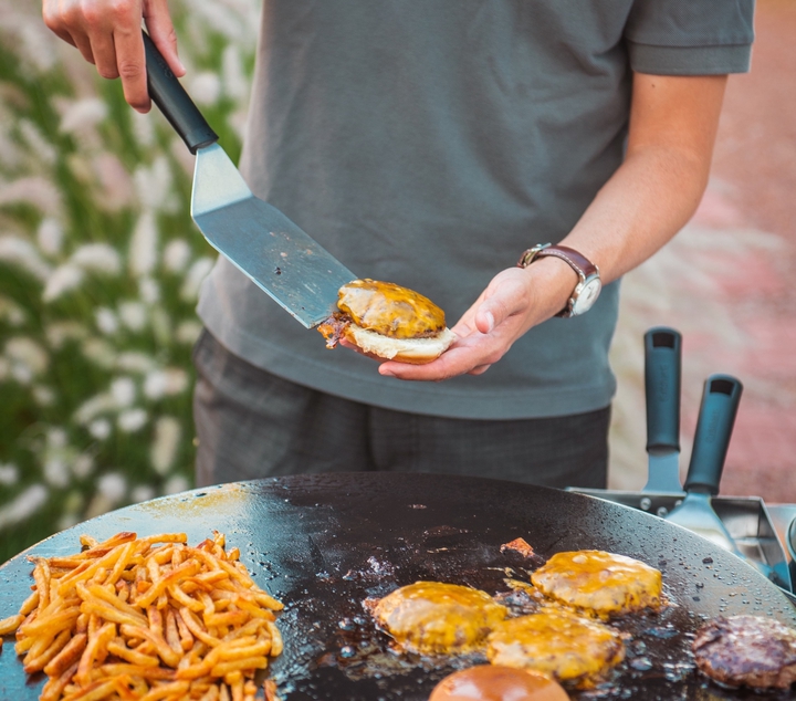 burgers being cooked on cuisinart griddle