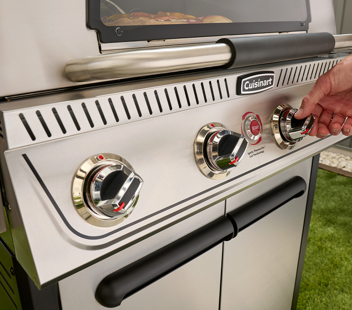 turning knob on gas grill