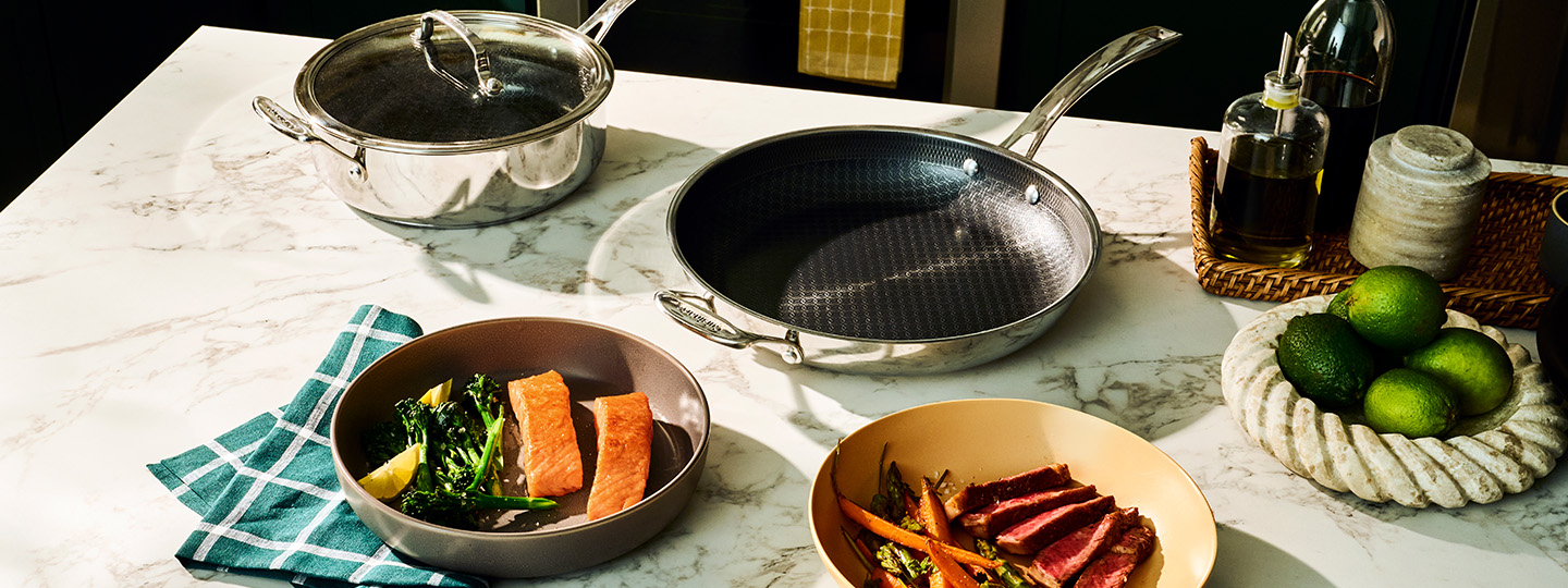 pans and plates of food on counter