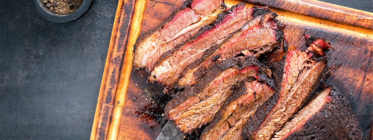 Smoked brisket on cutting board