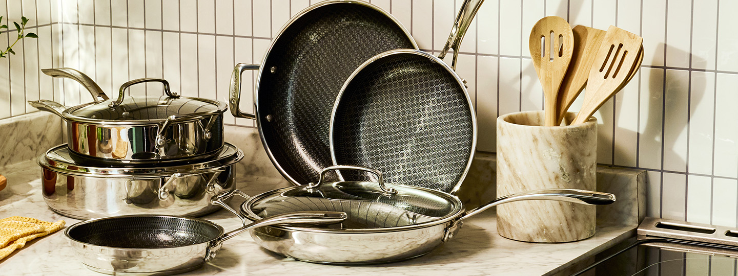 A collection of pans on a kitchen countertop