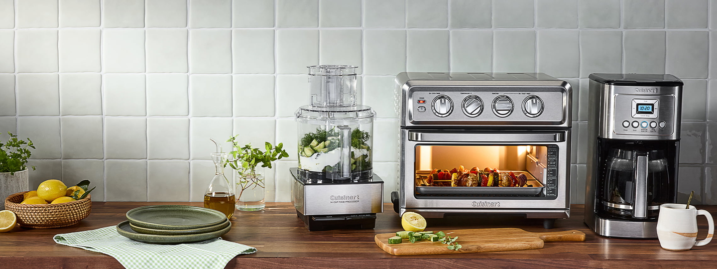 Cuisinart food processor and toaster oven air fryer with food.