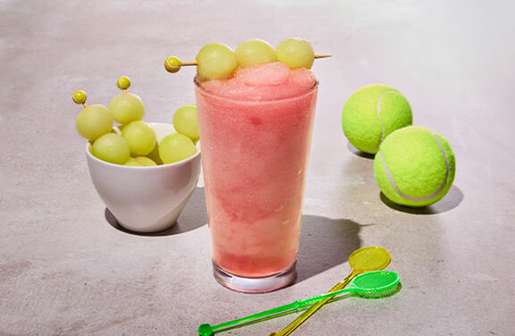 Spiked Raspberry Lemonade Slushie with Honeydew Melon Ball Skewers