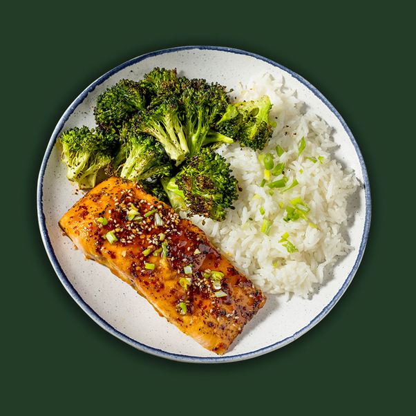 Salmon, broccoli and white rice plated