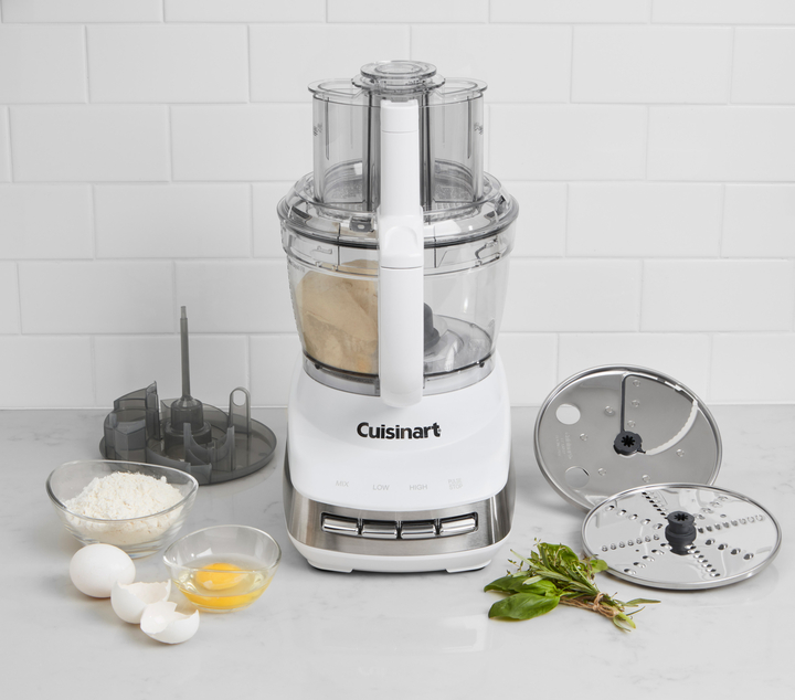 food processors with discs and accessories surrounding it