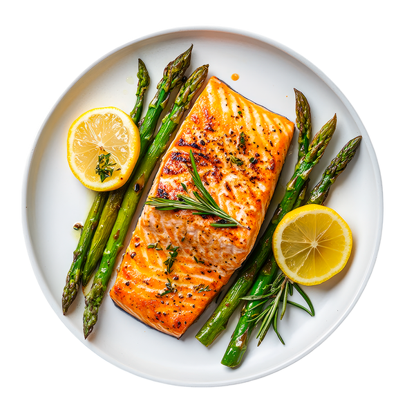 grilled salmon on a plate with lemon and asparagus