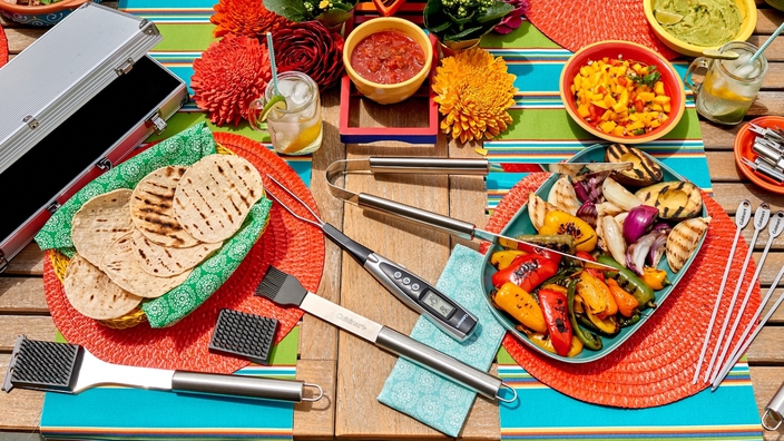 Cuisinart stainless steel tool set on table with food