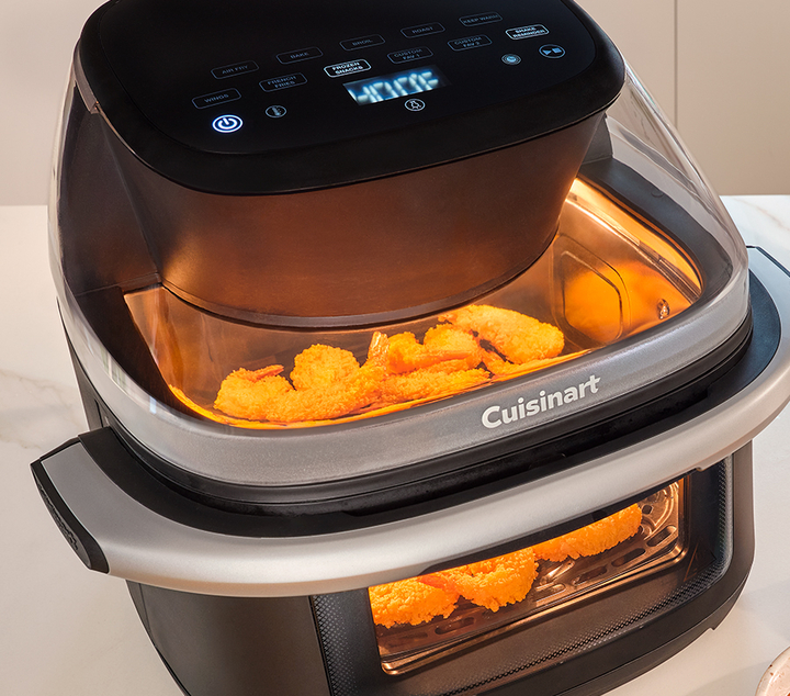 Cuisinart air fryer cooking fried shrimp viewing from above