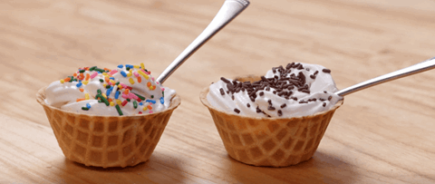 Soft Serve Vanilla Ice Cream with Sprinkles and Waffle Cones