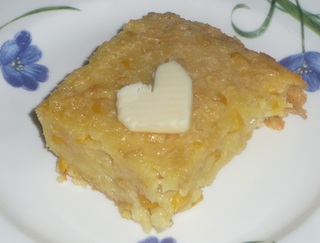 Soft and moist.  This casserole was topped off with a heart shped slice of butter. Submitted by Kika Fischer