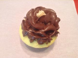 Yellow Cupcake with Chocolate Frosting Flower Submitted by Cupcakes Confidential