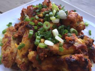 Spicy Indian Chicken Wings Garnished with Green Onions Submitted by Spicy Indian Chicken Wings